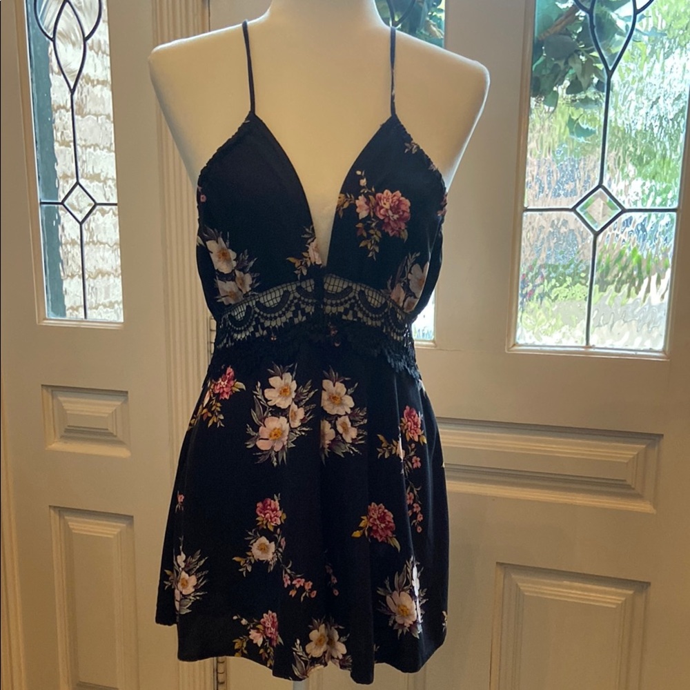 2/$15* Sale! Flirty floral black romper, Rue 21, size L.
